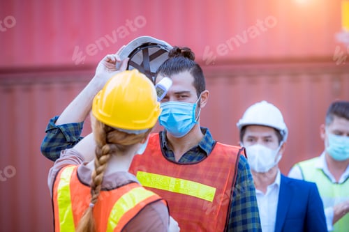 Preview: The worker used a medical Digital temperature Thermometer to check staff body temperature before sta