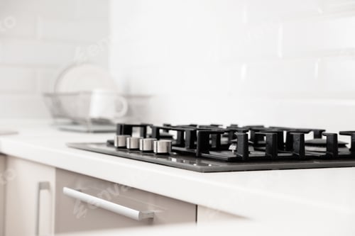 Preview: Modern built-in gas cooktop in light kitchen
