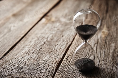Preview: Hourglass on wooden background, closeup. Urgency and running out of time concept