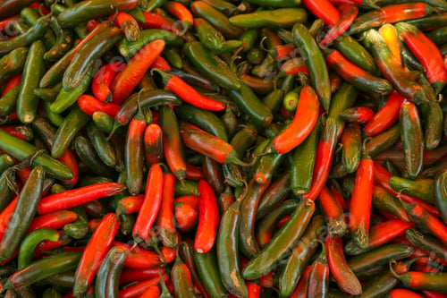 Preview: Heap of fresh Serrano peppers as background, top view