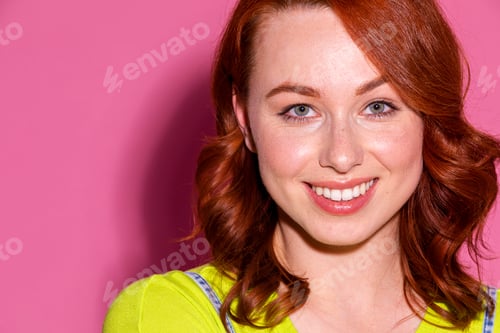 Preview: Happy red headed woman portrait