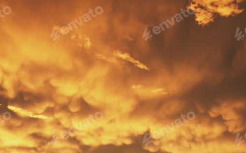 Preview: Cloudy and orange sky before sunset