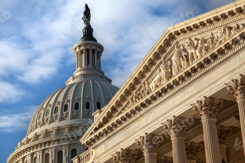 Preview: U.S. Capitol closeup of base relief and dome with Liberty statue early morning