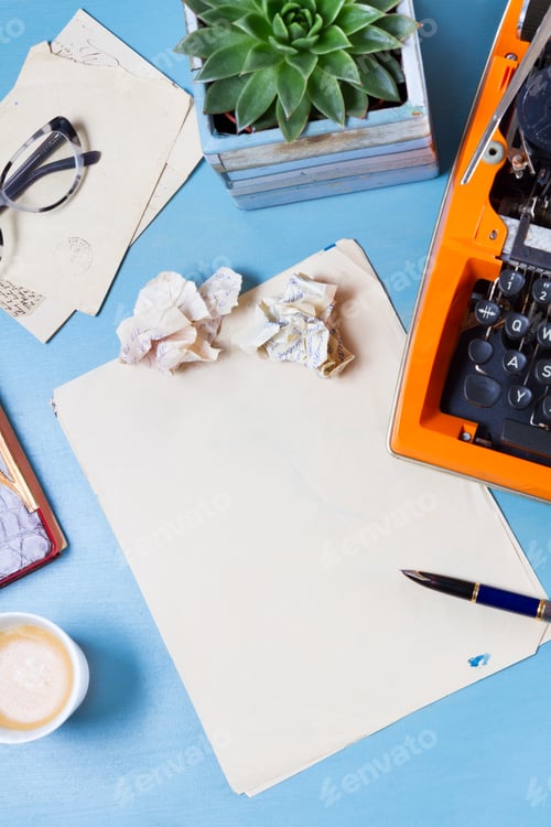 Preview: Workspace with vintage orange typewriter