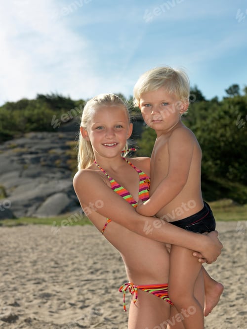 Preview: Sister holding little brother
