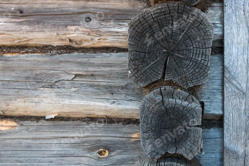 Preview: natural wooden background. wall made of old logs, place for an inscription