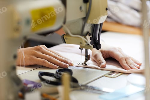 Preview: Woman sewing on sewing machine