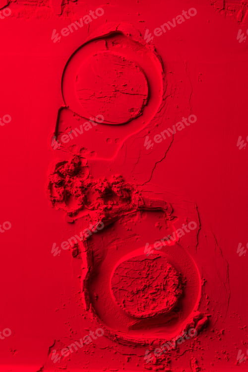 Preview: top view of shape of handcuffs on red powder