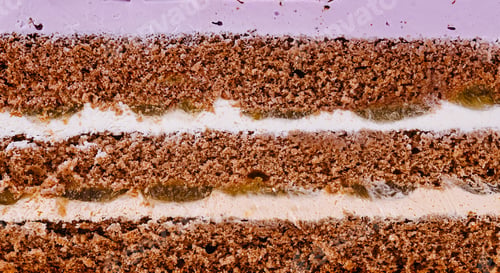 Preview: Delicious cake layers showing filling and frosting close up
