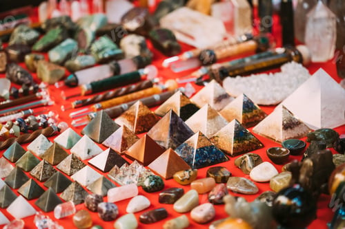 Preview: Goa, India. Set Of Indian Chakra Pyramids Made Of Quartz Natural Crystal. Stone Pyramids On Local
