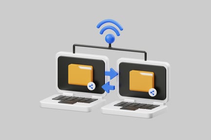 Preview: Two laptops transferring data wirelessly.