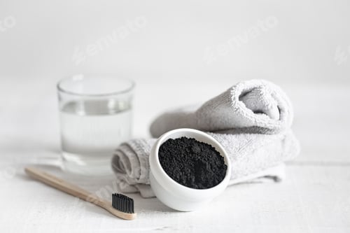 Preview: Composition with toothbrush and teeth whitening powder copy space.