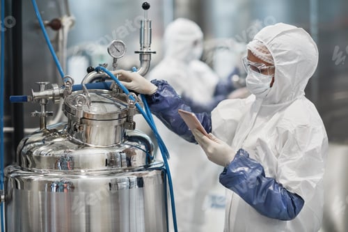 Preview: Woman Operating Pharmaceutical Production
