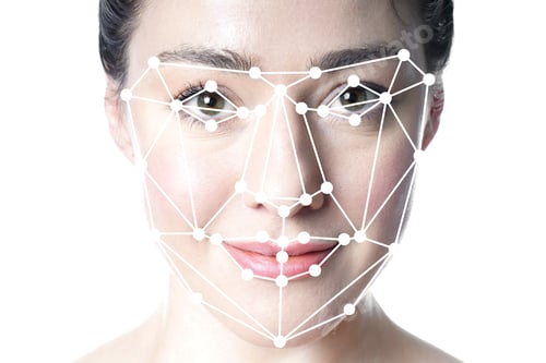 face detection or facial recognition grid overlay on face of young beautiful woman