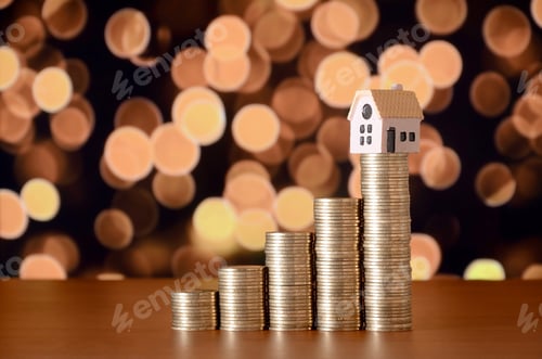 Preview: Planning savings money of coins to buy a home concept
