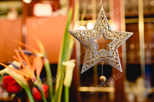 Preview: Christmas decoration in the shape of a star to hang in the home.
