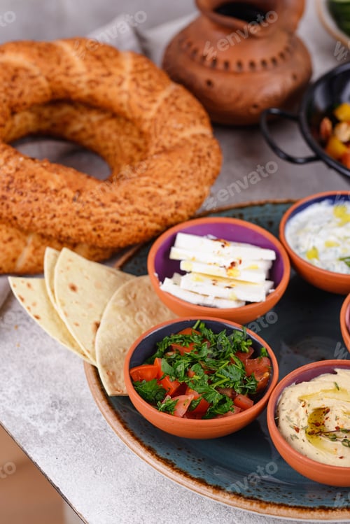 Preview: Traditional Turkish breakfast with meze and simit