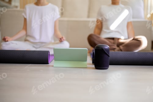 Preview: Couple look on each other during practising yoga