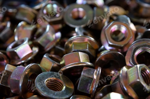 Preview: Closeup of metall nuts abstract industrial background