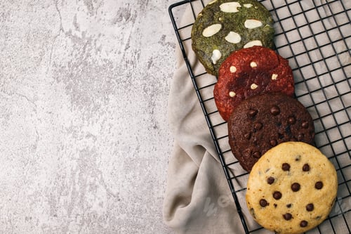 Preview: Colorful Gourmet Cookies on a Black Wire Rack