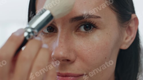 Preview: Pov morning girl makeup routine indoors. Portrait woman applying powder alone