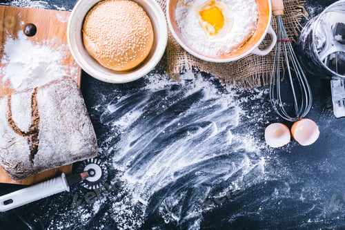 Preview: Ingredients and utensil for baking on the black board, top view
