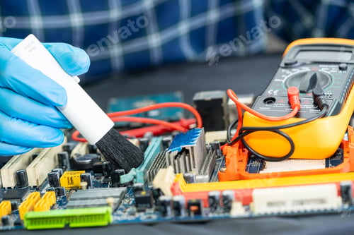 Preview: Asian technician repair and cleaning dirty micro circuit main board of smartphone electronic