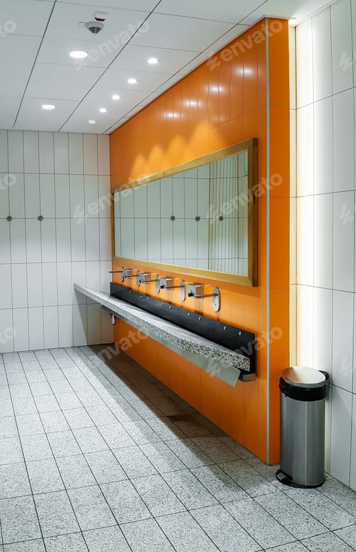 Preview: Public empty restroom with washstands mirror