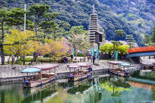 Preview: Uji, Japan - April 12, 2014: Gondoliers Prep Boats For Cruises On The Uji River In Kyoto