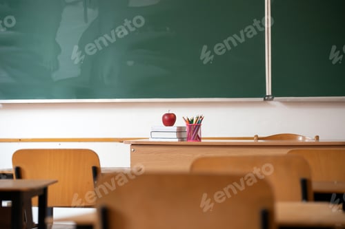 Preview: Classroom Scene with Apple and Writing Utensils