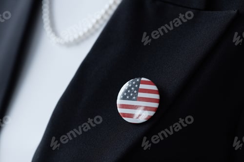 Preview: Caucasian Middle Aged Woman Wearing American Flag Pin in Business Setting