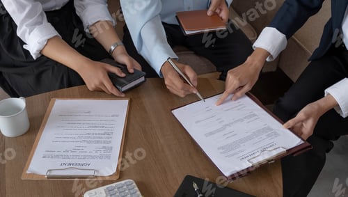 Preview: Real estate agent explaining and let customers sign a house purchase contract, discussing for contra