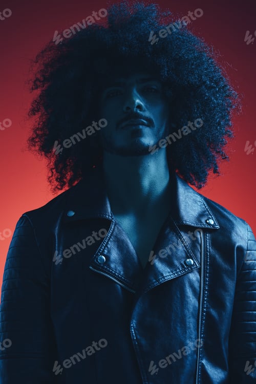 Preview: Portrait of fashion man with curly hair on red background multinational, colored light, black