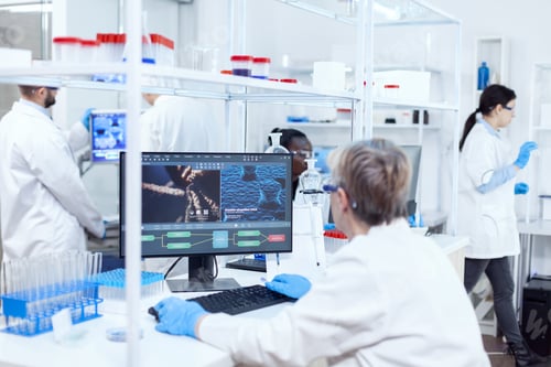 Preview: Senior scientist in pharmaceuticals laboratory doing genetic research
