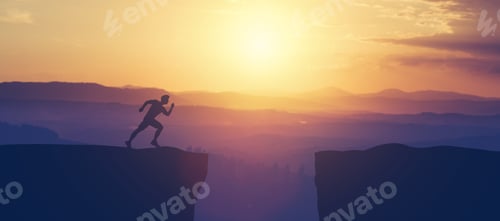 Preview: Man running towars cliff in the mountains.