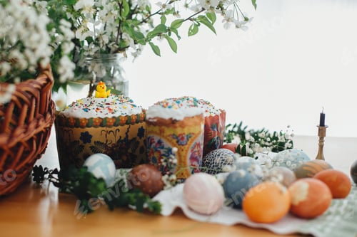 Preview: Easter cake, easter eggs natural dyed, candle, green branches and flowers