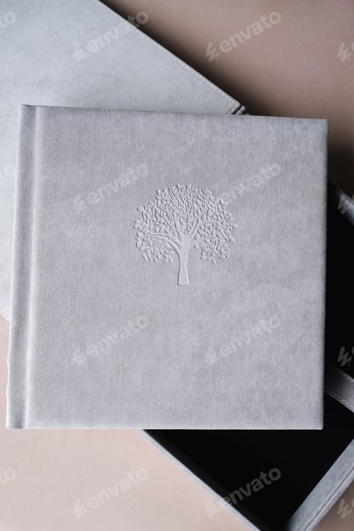 Preview: The photo book is grey in a soft cloth cover. the concept of creating books and albums