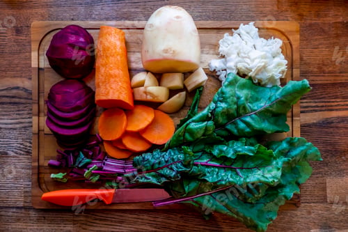Preview: Board with ingredients for preparing tasty borscht on white background