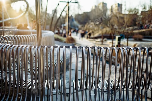 Preview: Close-up street bench metal pipes arranged parallel