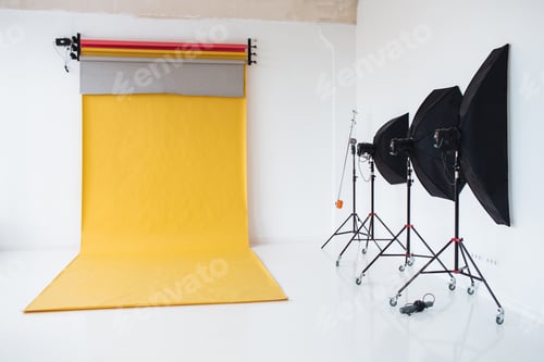 Preview: Photographing studio with light set up, modern lightning equipment for making high quality photos