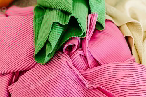 Preview: Bright Pink and Green Textured Fabrics Close Up