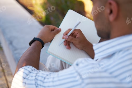Preview: Student studying, taking notes, selective focus. Education concept