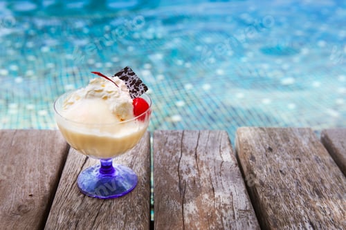 Preview: Mango ice cream with chocolate and cherry