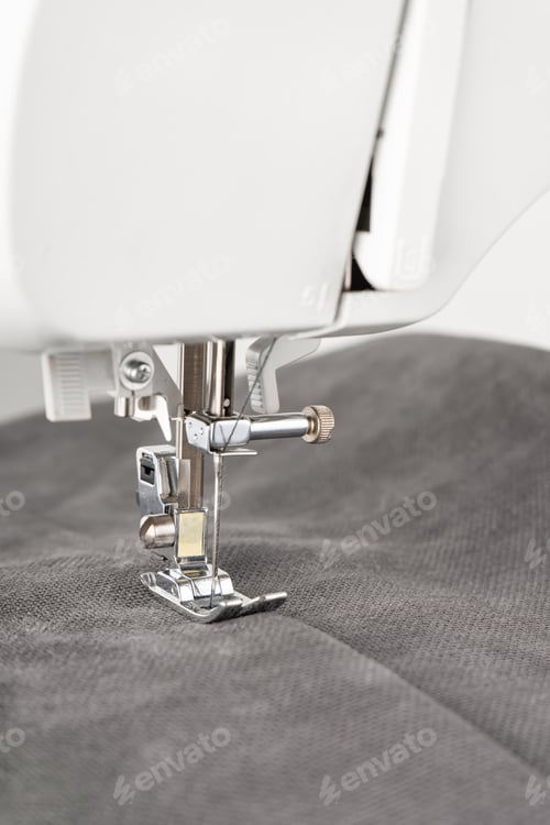 Preview: Modern Sewing Machine With Gray Fabric
