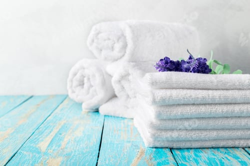 Preview: Beautiful spa composition on wooden table with flowers
