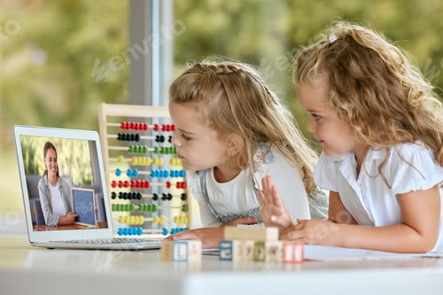 Preview: Laptop, learning and education with a girl and her twin sister in remote class from home with a tea
