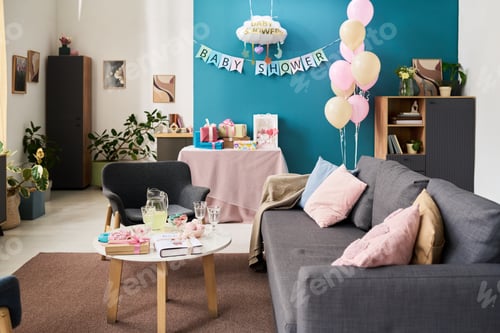 Preview: Decorated living room featuring pastel balloons, gift boxes, and baby shower banner