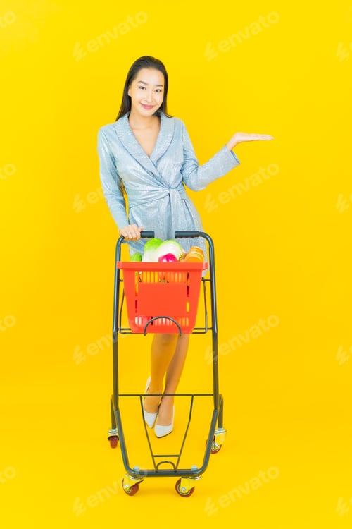 Preview: Portrait beautiful young asian woman smile with grocery basket
