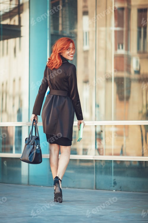 Preview: Businesswoman On The Way In Office Building