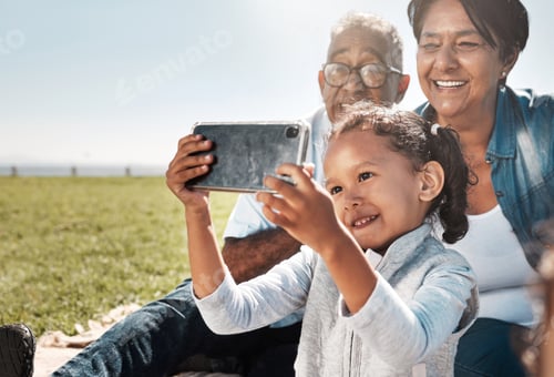 Preview: Selfie, phone and girl with grandparents in park for family, happy and technology in summer togethe
